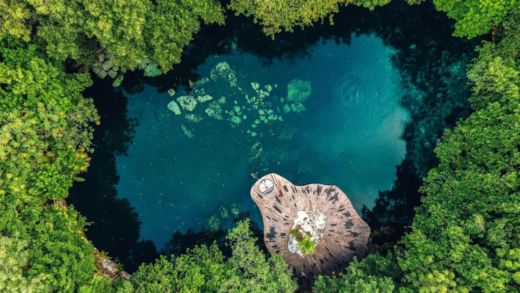 An aerial view of one of the cenotes at Sandos Caracol