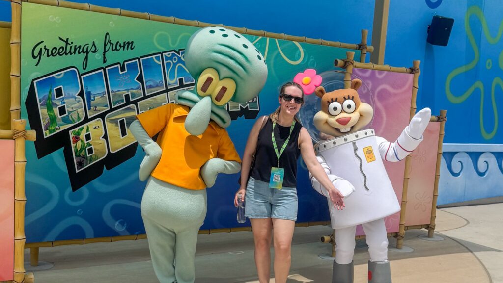 Theme park journalist Carly Neil meeting Squidward and Sandy from "SpongeBob SquarePants" at Universal Kids Resort