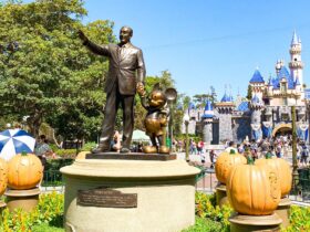 Sleeping Beauty Castle and the Partners Statue at Disneyland Park decorated for Halloween
