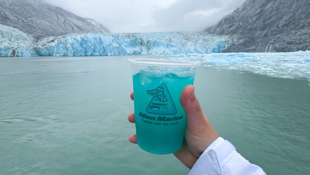 Glacierita cocktail in front of Dawes Glacier in Alaska