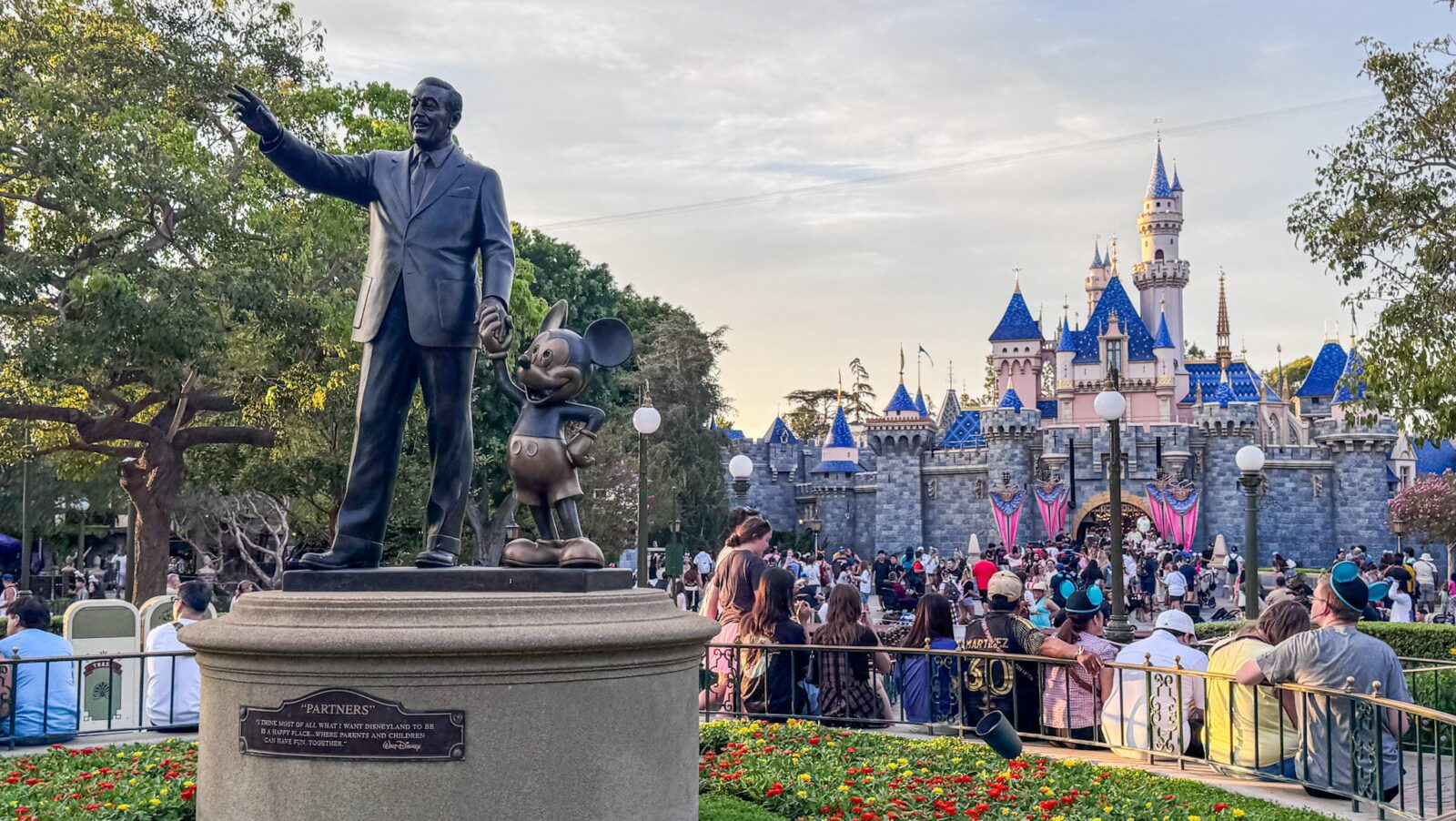 "Partners" statue of Walt Disney and Mickey Mouse in front of Sleeping Beauty Castle at Disneyland Park
