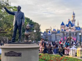 "Partners" statue of Walt Disney and Mickey Mouse in front of Sleeping Beauty Castle at Disneyland Park