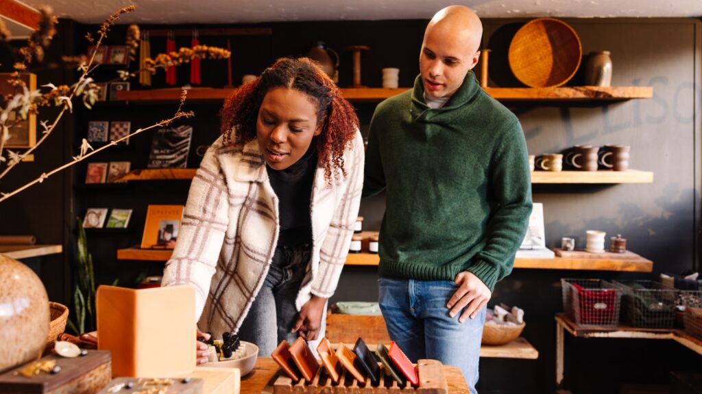 A man and woman looking at crafts in Boone, NC