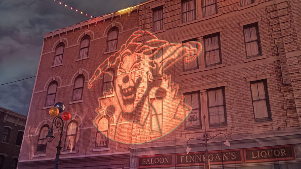 Jack the Clown projected onto building facade at Halloween Horror Nights at Universal Orlando